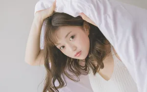 慵懒水嫩美女床上写真图片_3