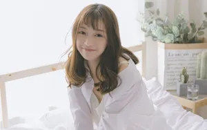 慵懒水嫩美女床上写真图片_4
