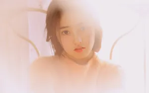 黄色调床上美女暖心图片_8
