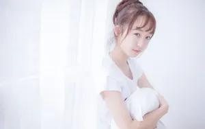 丸子头少女床上图片_10