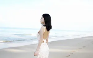 美女少妇海边写真图片壁纸_9