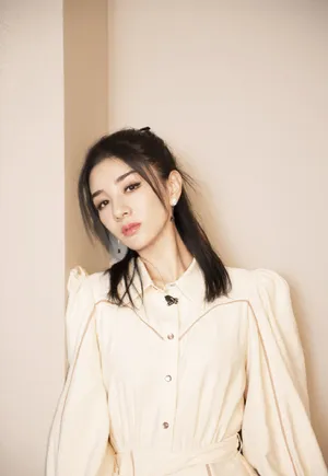 黄奕淡黄的长裙性感写真图片