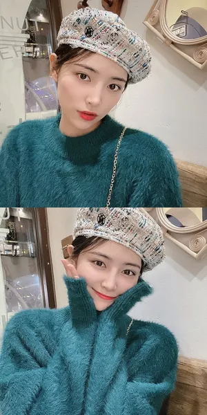 THE9许佳琪蓝色毛衣温暖俏丽私服图片