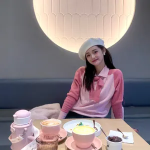 周洁琼粉色毛衣白帽俏丽写真图片_8