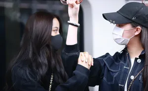 欧阳娜娜携妹妹装扮帅气美丽机场照图片_3