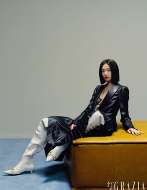 万茜性感冷艳黑丝修长美腿写真图片
