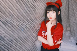 赖美云红色蝴蝶结俏丽写真图片_5