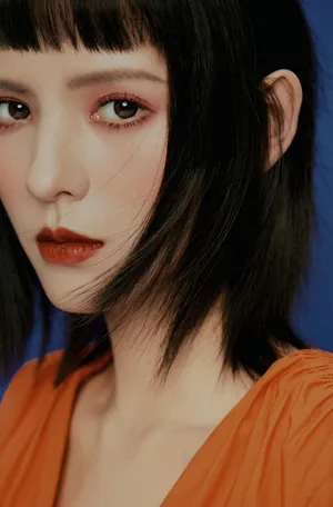 张予曦橘色元气妆酷美写真图片_2