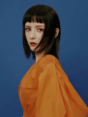 张予曦橘色元气妆酷美写真图片_4