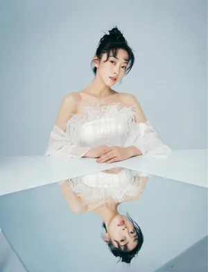 宣璐白色羽毛裙仙气写真图片