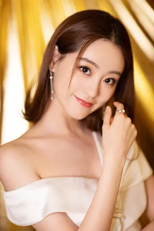祝绪丹露肩白裙性感写真图片