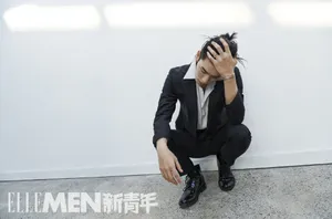 王子异湿发西装酷帅写真图片