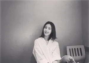 小龙女毛晓慧白衬衣写真图片_5