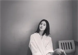 小龙女毛晓慧白衬衣写真图片_7