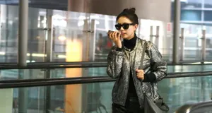 高圆圆平底鞋现身机场身材浑圆疑有身孕_5