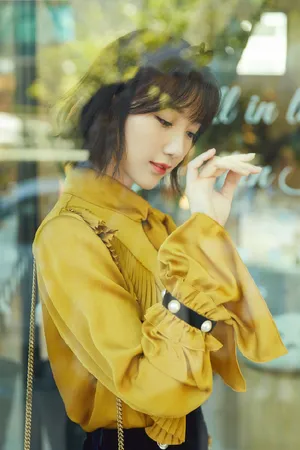 毛晓彤百变风格写真图片