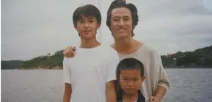 韩庚童年萌照曝光俊俏酷似女孩_1