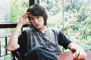 胡歌早年长发青涩写真图片_7