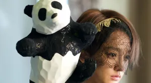 周迅黄晓明携众星拍公益写真为大熊猫筹款_12