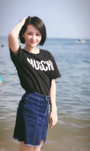 邓莎短袖牛仔裙海岸清爽写真图片_2