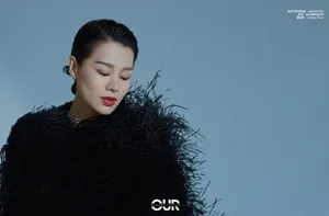 胡杏儿黑色羽毛裙魅力写真图片