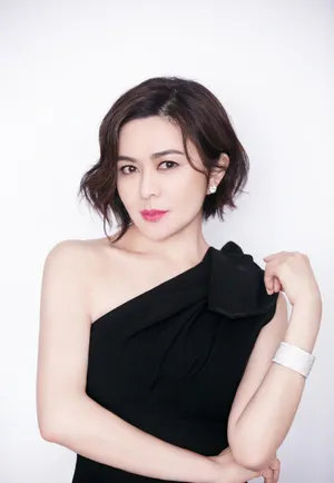 关之琳黑色高开叉礼服性感图片_8