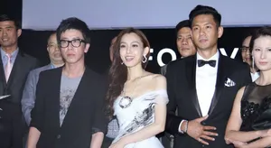 范玮琪着婚纱亮相图片 牵手黑人陈建州大秀恩爱_3