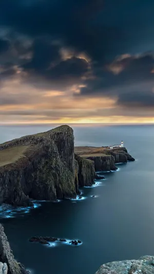 黄昏大海边的悬崖唯美手机背景