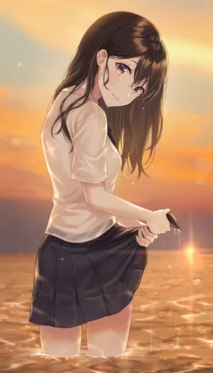 女高中生 女孩子 制服 夕阳 海 水面