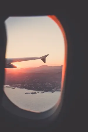 飞机窗口  旅行 天空 海 山 日出 日落