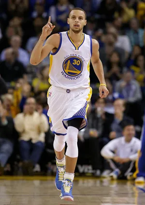 NBA篮球明星勇士队斯蒂芬库里指天庆祝