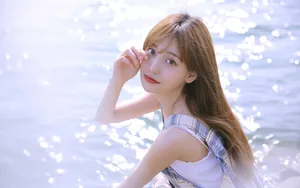 海边清纯长发飘飘美女图片_4
