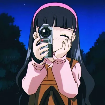 拿相机的动漫女头像第1张